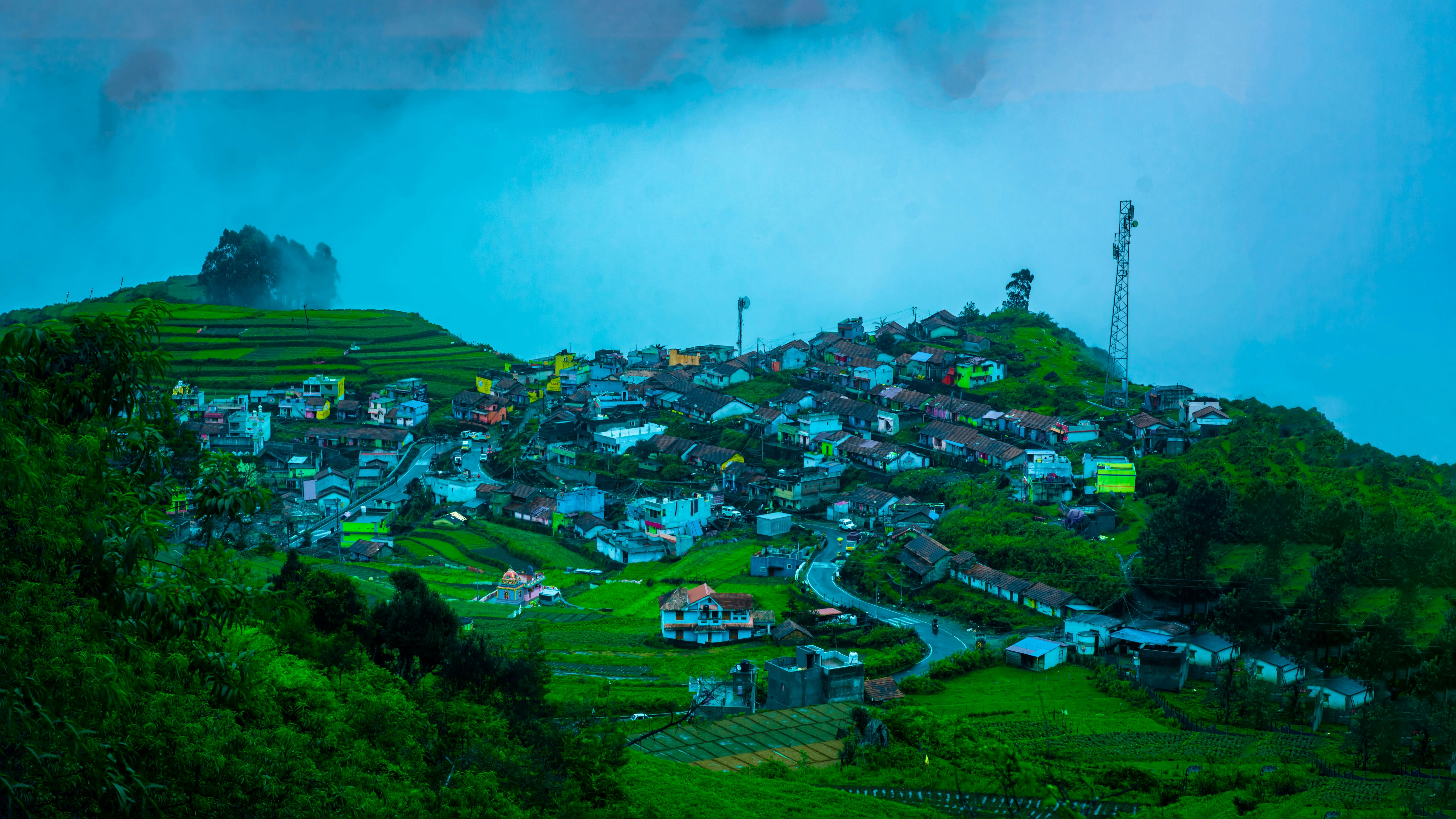 Tea gardens and mountain ridges at a hill station in India